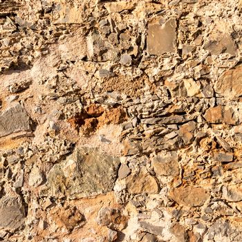 Background of ancient stone wall. Texture of old brick.