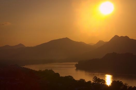 Sunset over the Mekong river from Mount Phou Si, in Luang Prabang, Laos.