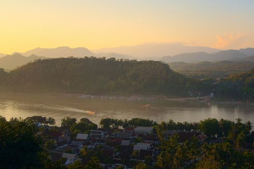 Elevated view of the city of Luang Prabang, Laos and Mekong river, in the afternoon.