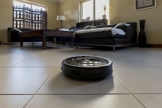 Roomba iRobot is an automated vacuum cleaning robot and powered by a rechargeable battery