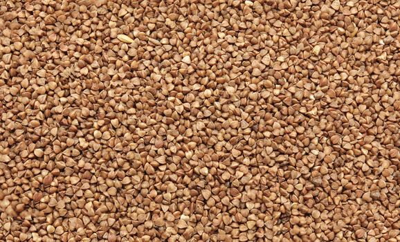 Buckwheat texture -uncooked raw food, close up