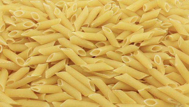 Texture of spaghetti- raw uncooked macaroni, close up
