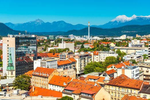 Beautiful cityscape of Ljubljana, panoramic view of the European city with mountains Alps in the background, Slovenia