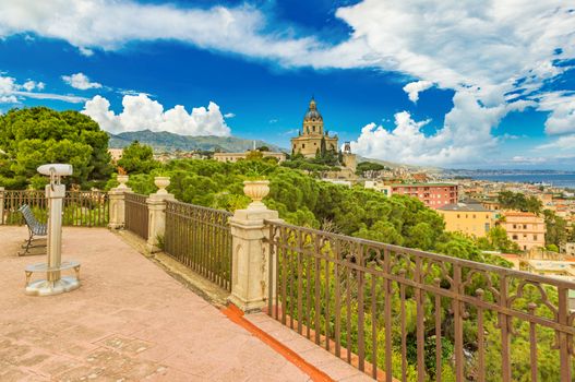 Picturesque cityscape of Messina viewed from a balcony with fence. One of the largest cities on the Island of Sicily, Italy