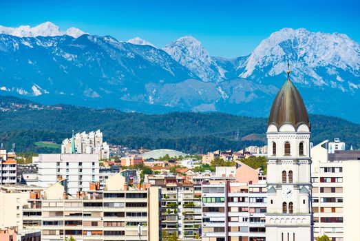 Scenic view of Ljubljana with snowy Alps in the background, Slovenia
