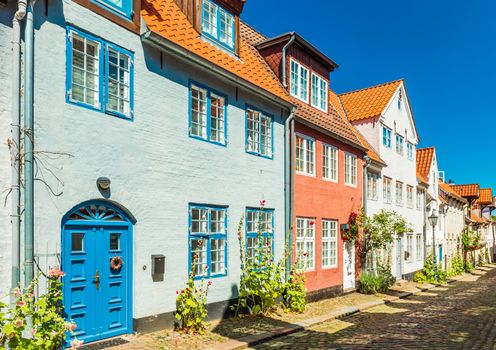 View of a typical german-danish street with colored houses. Traditional architecture style. Flensburg, Germany