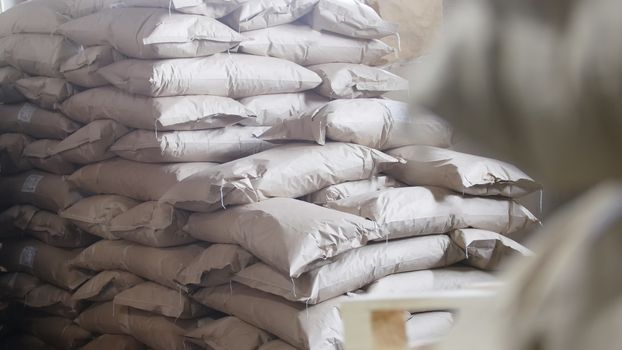 Big warehouse with bags at the pasta factory, close up