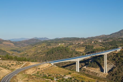 Scenic view of the Douro Valley and river with terraced vineyards near the village of Tua, Portugal