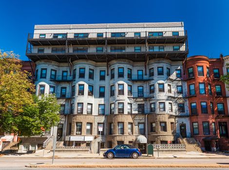 Boston - July 2016, MA, USA: Residential apartment building on one of the streets of Boston Back Bay neighborhood, unusual architecture style