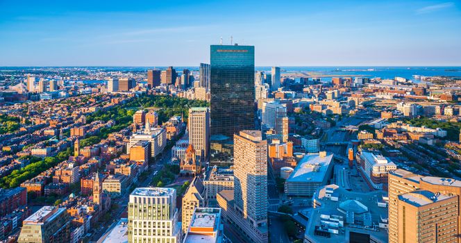 Boston - June 2016, Massachusetts, USA: Boston skyline at the evening. View on downtown and John Hancock Tower from the top of The Prudential Center in Back Bay