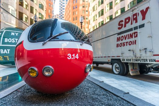 Boston - June 2016, MA, USA: Spheric installation in downtown Boston. Modern sculpture of metro train.