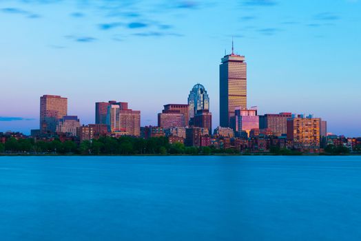 Boston - June 2016, MA, USA: Cityscape at sunset. Prudential Tower and surrounding buildings in Boston Back Bay. Urban panorama in the evening
