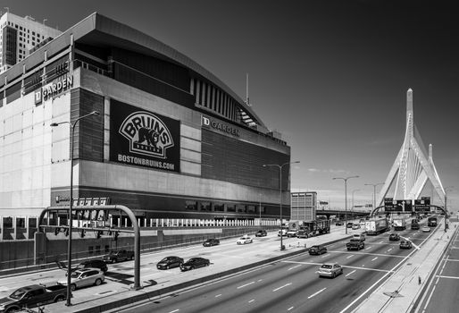Boston - June 2016, Massachusetts, USA: Boston Bruins stadium (TD Garden) and highway with traffic on Leonard P. Zakim Bunker Hill Memorial Bridge