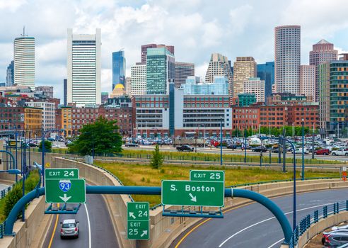 Boston - June 2016, USA: Boston skyline in summer day, view of downtown and highway with traffic