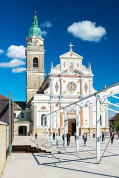 Brezje - May 2017, Slovenia: The Basilica of St. Mary Help and people walking around