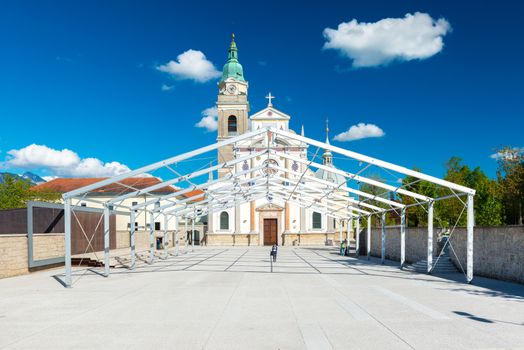 Brezje - May 2017, Slovenia: The Basilica of St. Mary Help against the blue sky with clouds.