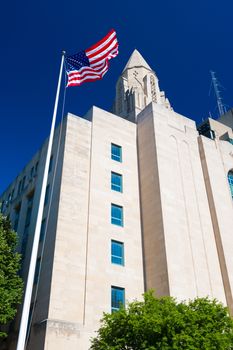 Boston, Massachusetts - June 2016, USA: Boston University building with American flag on flagpole