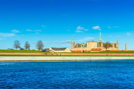 Helsingor - October 2018, Denmark: The famous castle Kronborg also known as Elsinore. Panoramic view of the main landmark of the city, North Sea and blue sky