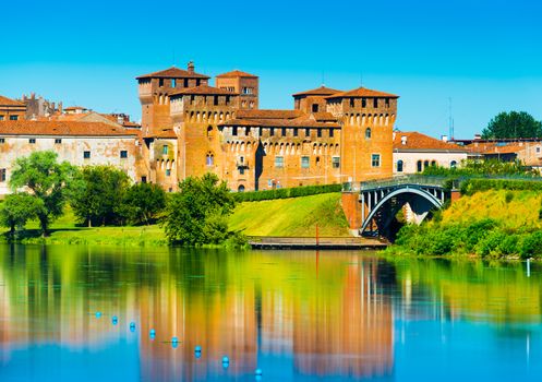 Mantova - August 2017, Italy: Castle of Saint George reflected in water. One of the main landmarks in Mantua