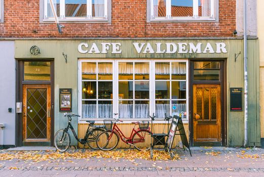 Helsingor - October 2018, Denmark: View of a small cozy cafe on one of the streets of a small Danish city