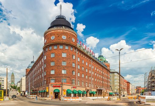 Helsinki - June 2019, Finland: View of a triangle building built of red brick in the traditional Scandinavian architecture style. Oxygenol company building