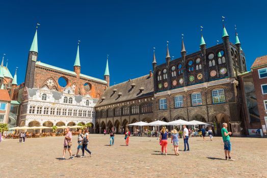 Lubeck - July 2018, Germany:  View of the central square of Lubeck and City Administration building. One of the most visited cities in northern Germany. Popular touristic destination