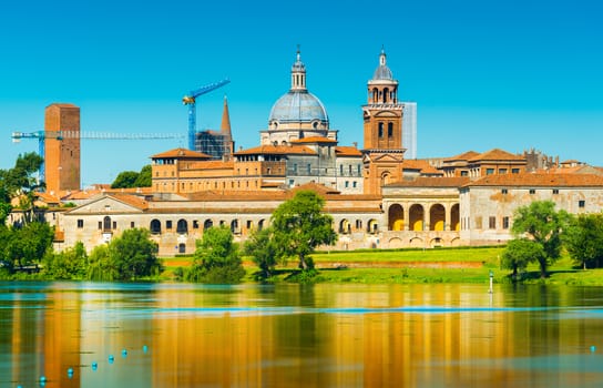Mantova - July 2017, Italy: Old architecture of Mantova reflected in water. Unesco world heritage. Cityscape of the old Italian city