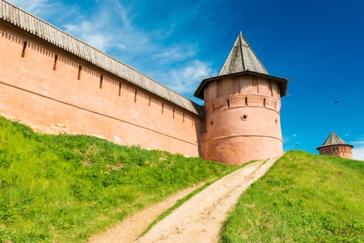 Suzdal - May 2018, Vladimir region, Russia: Ancient stone walls with towers in the famous Russian town. Cultural heritage, The Golden Ring of Russia