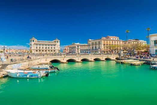 Syracuse - April 2019, Italy: View of the canal and Umbertino bridge between Syracuse and Ortygia