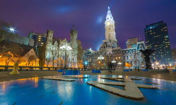 Philadelphia - April 2015, USA: Wide angle view of Philadelphia historic city center at night, one of the famous landmarks - building of Philadelphia City Hall, the seat of government for the city