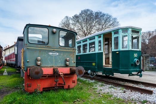Trieste (Friuli Venezia Giulia region) - March 2016, Italy: Old  locomotive and tram in Railroad Museum (Museo Ferroviario di Trieste)