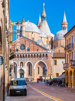 Padova (Padua) - February 2017, Italy: The street of Padua with traffic. The Basilica of St. Anthony of Padua (Basilica di Sant'Antonio di Padova)