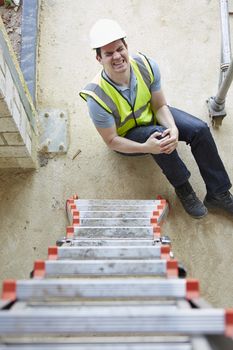 Construction Worker Falling Off Ladder And Injuring Leg