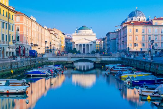 Trieste - February of 2015, Italy: View of Grand Canal in Trieste, city reflected in the water, long exposure photography