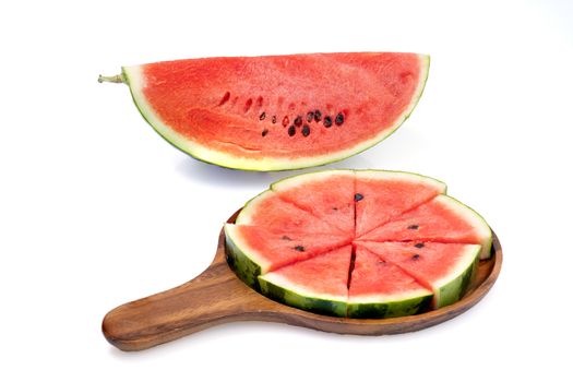 watermelon on wooden tray isolated on white background