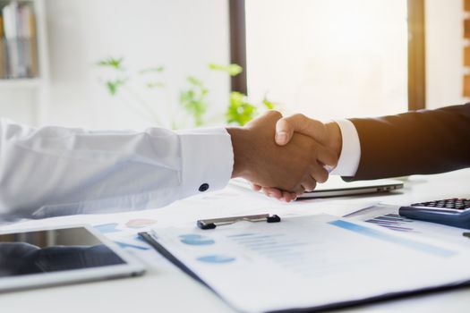 business people negotiate and shake hands with investor partner  after successful agreement