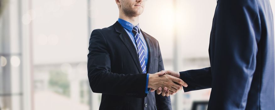 Success business, successful agreement negotiation and confident partner cooperation concept, Businessman shake hands with customer in banner background	