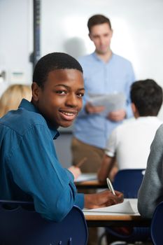 Portrait Of An African American Male Teenage Pupil In Class