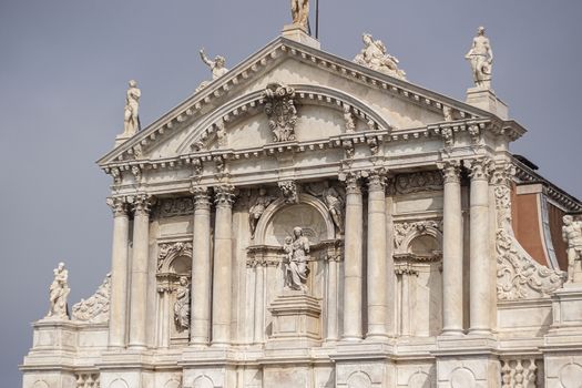 Italian church architecture detail during a cloudy day