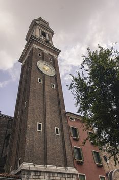 Deatil of Santi Apostoli bell tower in Venice in Italy