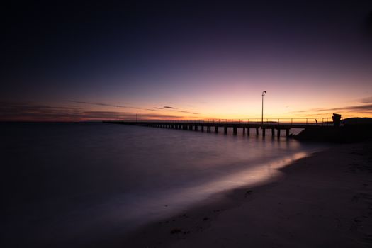 The iconic Rye Pier on a cool winter's morning at sunrise on the Mornington Peninsula in Melbourne, Victoria, Australia