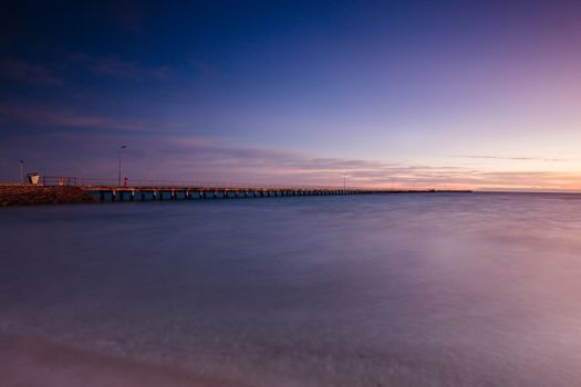 The iconic Rye Pier on a cool winter's morning at sunrise on the Mornington Peninsula in Melbourne, Victoria, Australia