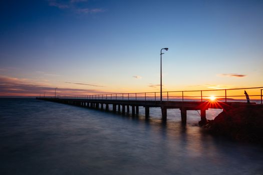 The iconic Rye Pier on a cool winter's morning at sunrise on the Mornington Peninsula in Melbourne, Victoria, Australia