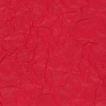 red rippled paper texture useful as a background and Christmas decorations