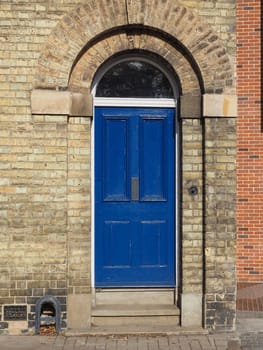 blue traditional entrance door of a British house