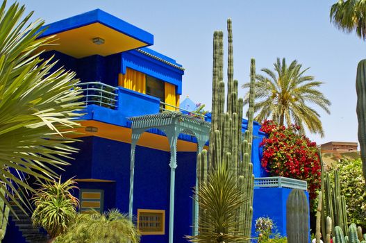 THE MUSEUM BUILDING AND GARDEN, MARRAKECH, MOROCCO. MAY The colourful modern decoration of the museum building with planted containers and plants in the garden of the artist Jacques Majorelle