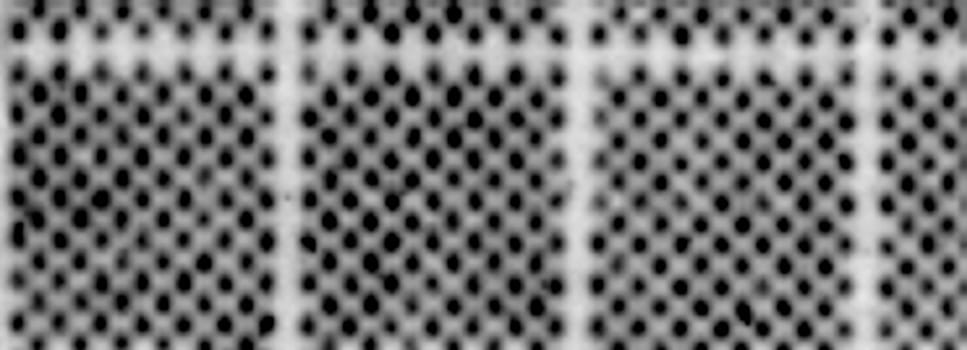 abstract defocused blur black and white mesh grid useful as a background
