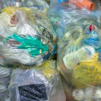 Close Up of garbage and waste in transparent bags