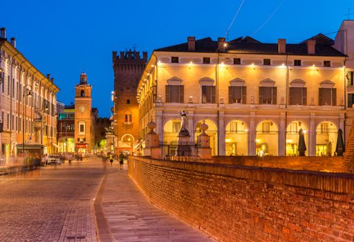 Ferrara - July 2017, Italy: Evening view of the historic center of Ferrara. Illuminated old architecture and the city landmarks. Long exposure photography
