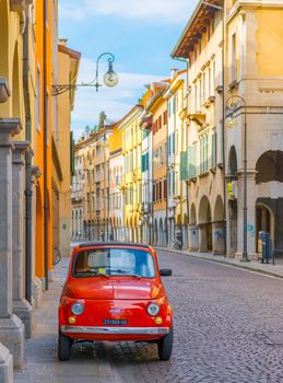 Udine - March 2016, Italy: Vintage Fiat 500 parked on the street of the old Italian city of Udine